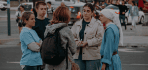 Group chatting near church